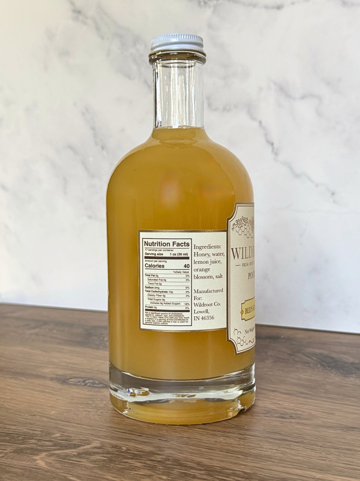 Bottle of Wildroot Bee's Knees