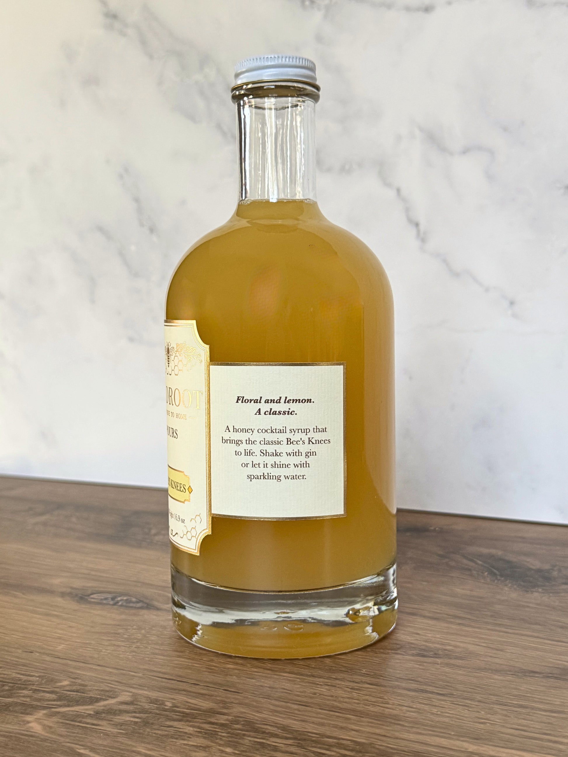 Bottle of Wildroot Bee's Knees